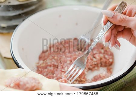 Fresh Meat Is Overwound On Forcemeat.