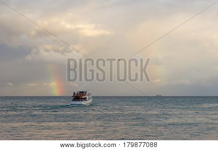 Small pleasure boat in the fall evening on a Black Sea Crimea Ukraine.