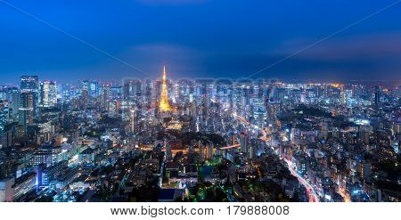Panorama view over Tokyo tower and Tokyo cityscape view from Roppongi Hills at night in TokyoJapan