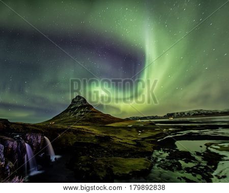 Northern Light Aurora Borealis At Kirkjufell Iceland With Fully Start In The Sky
