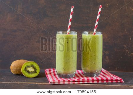 Healthy green smoothie with kiwi and spinach.