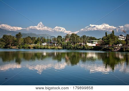 View At Annapurna Mountain Range And Its Reflection In Phewa Lake In Pokhara, Nepal