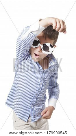 Young cool caucasian boy with sunglasses esulting