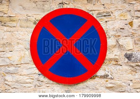 Parking restriction sign in old Cyprus village