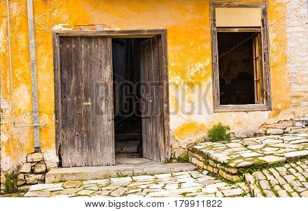 Abandoned and neglected house. Ruined old building