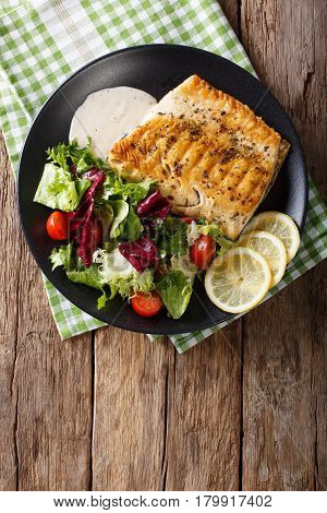 Tasty Roasted Fish Fillet Arctic Char And Fresh Vegetables Close-up. Vertical Top View