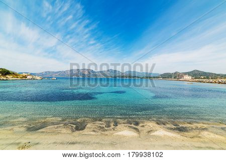 Clouds over Fortezza Vecchia beach in Sardinia