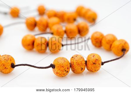 Original female beads from polymeric hand-worked clay