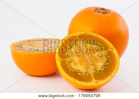 Lulo ( Solanum quitoense ) on white background