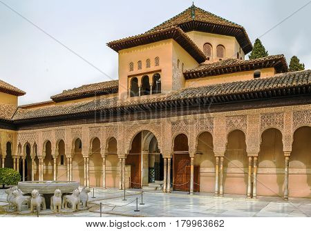 Court of the Lions is the main courtyard in Nasrid dynasty Palace Alhambra Granada Spain