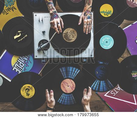 Hands holding music vinyl collectible record