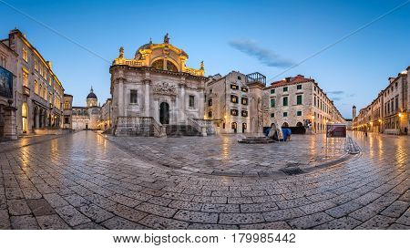 DUBROVNIK CROATIA - JULY 1 2014: Panorama of Luza Square and Saint Blaise Church in Dubrovnik. In 1979 the city of Dubrovnik joined the UNESCO list of World Heritage Sites.