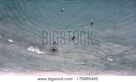 Aerial view of sup boards on the sea. Top view beachlife on a sunny day. View from above.