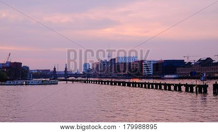 View on Oberbaum Bridge TV Tower office buildings and river Sprea in Berlin Germany - 01.04.2017.