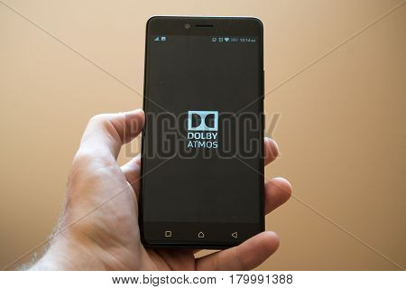 Nitra, Slovakia, March 24, 2017: Dolby Atmos application logo on smartphone
