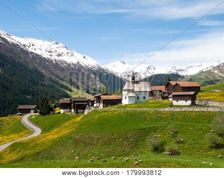 Surselva Switzerland: Valley View Surselva. The valley is illuminated by the sun during a beautiful day on the day of the Feast of the Ascension.