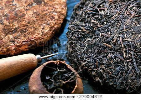 Pressed Pu-erh Tea, Pu'er In Tangerine, Blooming Tea Cakes And Knife For Drinking Ceremony. Traditio