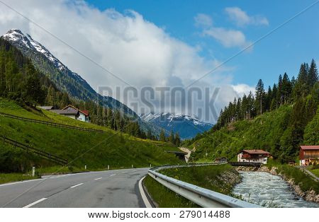 Summer Alps Mountain Landscape With Alpine River And Road (silvretta Alps, Austria).