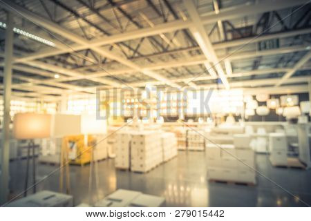 Blurry Background Variety Of Table, Ceiling, Floor Lamps At Furn