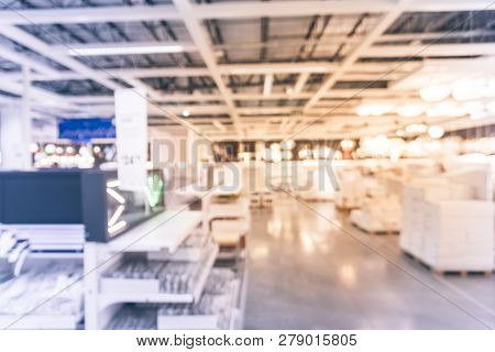 Blurry Background Variety Of Table, Ceiling, Floor Lamps At Furn