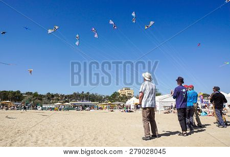 Cervia, Italy, April 2018: Many Colorful Kites In Different Shapes At Cervia International Kite Fest
