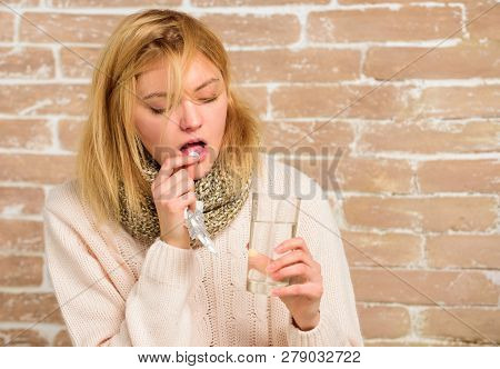Woman Tousled Hair Scarf Hold Glass Water And Tablets Blister. Girl Suffer Fever And Take Medicine. 