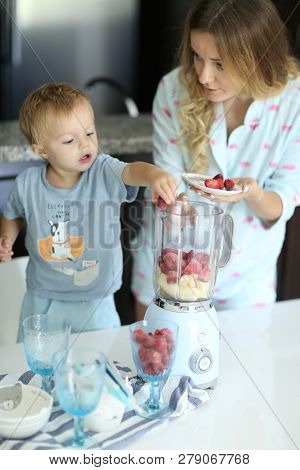 Mom And Toddler Are Cooking Smoothie As Their Version Of Healthy Beakfast
