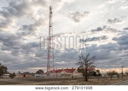 Carnavon, South Africa, September 1, 2018: An Early Morning Street Scene, With A Telecommunications 