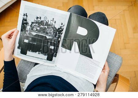 Paris, France - Jan 2, 2019: Woman Reading Article In M Le Magazine Du Monde With Controversial Cove