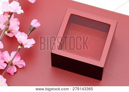 Japanese Wooden Box Masu With Sake On A Wooden Plate