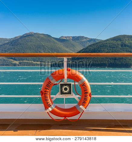 September 14, 2018 - Inside Passage, Alaska: Orange Lifering On Cruise Ship.