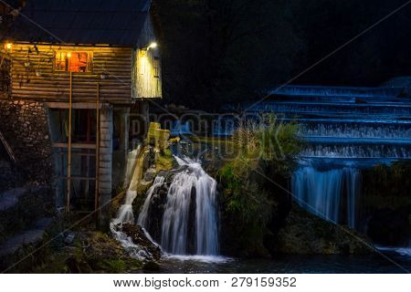 The Small House Lighting At Night On The Kostelski Buk Next To T