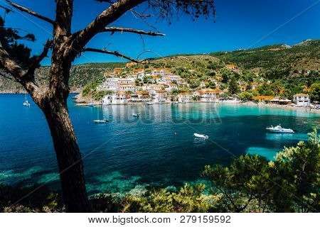 Assos Village, Kefalonia Greece. View On Turquoise Transparent Bay Lagoon Of Mediterranean Sea. Surr