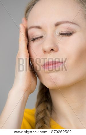 Young Blonde Woman Having Serious Migrene Suffering From Horrible Head Ache Feeling Big Pain.