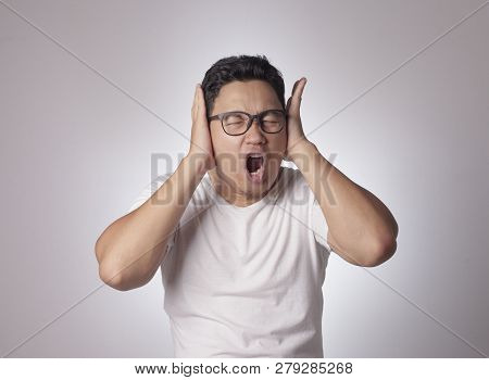 Young Man Close His Ears Dont Want To Hear Something Bad