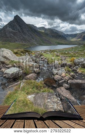 Beautiful Landscape Image Of Stream Near Llyn Ogwen In Snowdonia During Early Autumn Flowing Towards