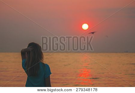 Lovers On The Sea Looking At The Sunset. Selective Focus
