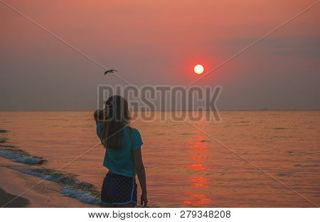 Lovers On The Sea Looking At The Sunset. Selective Focus