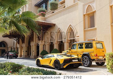 Dubai, Uae - January 08, 2019: Yellow Luxury Supercar Lamborghini Aventador Roadster And Gelandewage