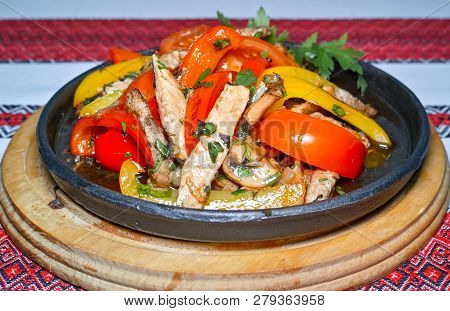 Grilled Meat With Tomatoes, Peppers And Mushrooms, Sprinkled With Parsley.