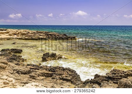 Seascape With Rocks , Turquoise Sea And Blue Sky , Shore Of The Mediterranean Sea. Coast Of Island C