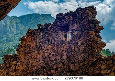 Medieval Rock Fortress In North Ossetia Alania, Russia, Dzivgis Village. Medieval Monument Of Archit