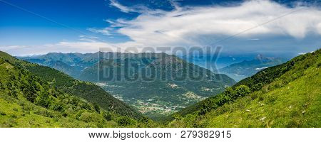 Panoramic View Of Pizzo Di Gino, Monte Grona, Monte Legnone, Lake Como And Surrounding Mountains As 