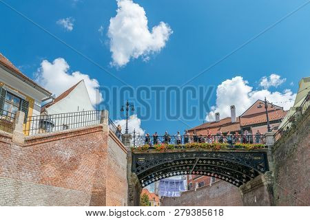 Sibiu, Romania - July 21, 2018: Tourists On The Bridge Of Lies, One Of The Most Important Symbols Of