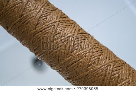 Hand Holding Dirty Water Filter Cartridge Over The Bathhub