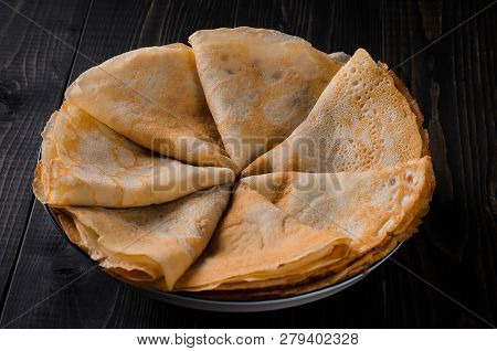 Pancakes. Food Still Life, Home Cooking Recipe. Natural Light, Slightly Toned Image, Dark Black Back