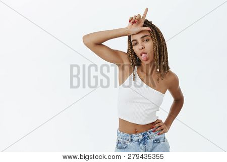 L Word Means Loser. Portrait Of Outgoing Cool And Stylish African American Female With Dreadlocks Mo