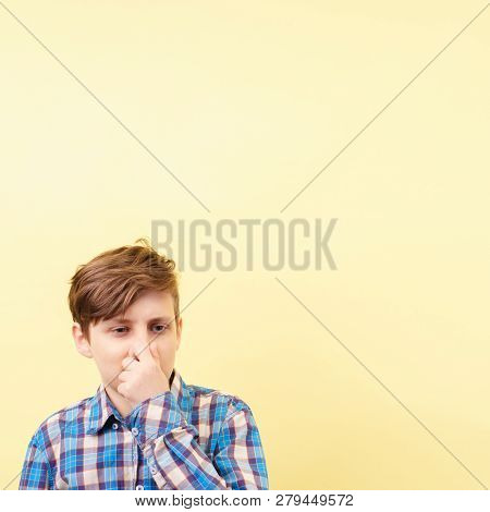 Bad Smell, Stink, Rancid Foul Terrible Odour. Boy Holding His Breath And Covering Nose.