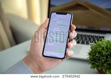Alushta, Russia - October 9, 2018: Man Holding Iphone X With Social Networking Service Whatsapp On T