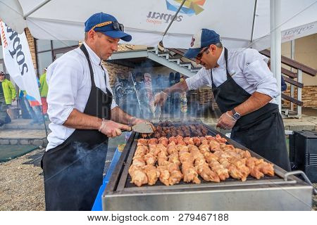 Sochi, Russia - May 29, 2015: Men Cook Grilled Barbecue In Open Air. Catering At Gorky Gorod Resort